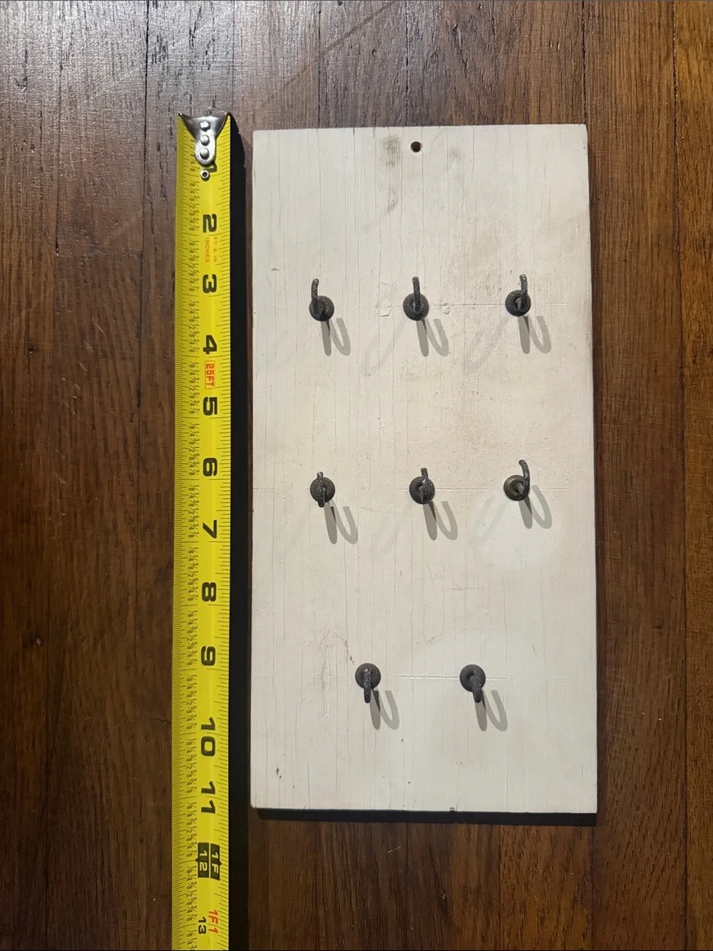 Rustic old worn Wooden Wall Hook Board in Cream with Black Hooks